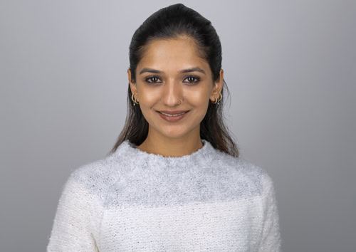 Portrait of Tanya Malik with a friendly smile and professional appearance.