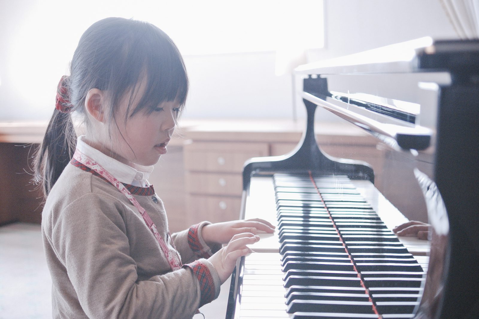 A child practising the piano