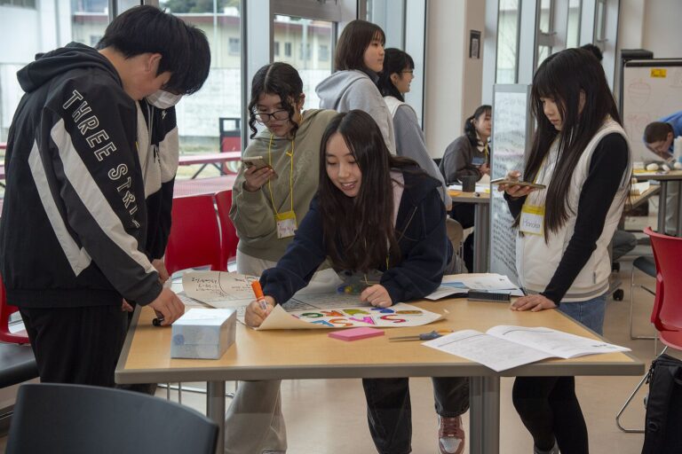 High school students working together on a group project
