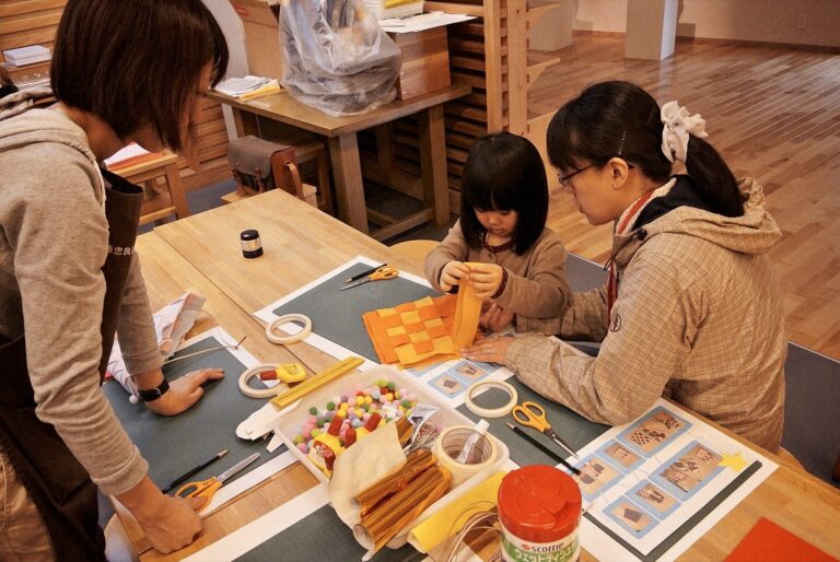 Children making things at a hands-on workshop
