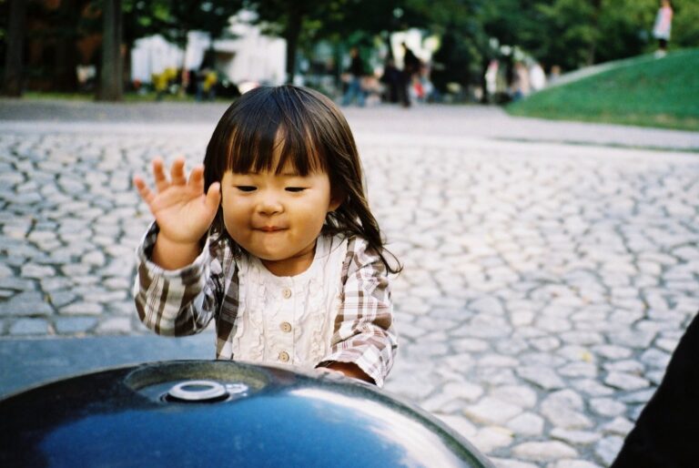 A child playing a drum